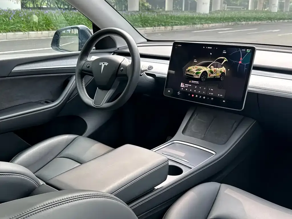 Tesla Model Y — фото 6