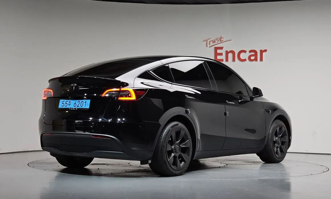Tesla Model Y — фото 6