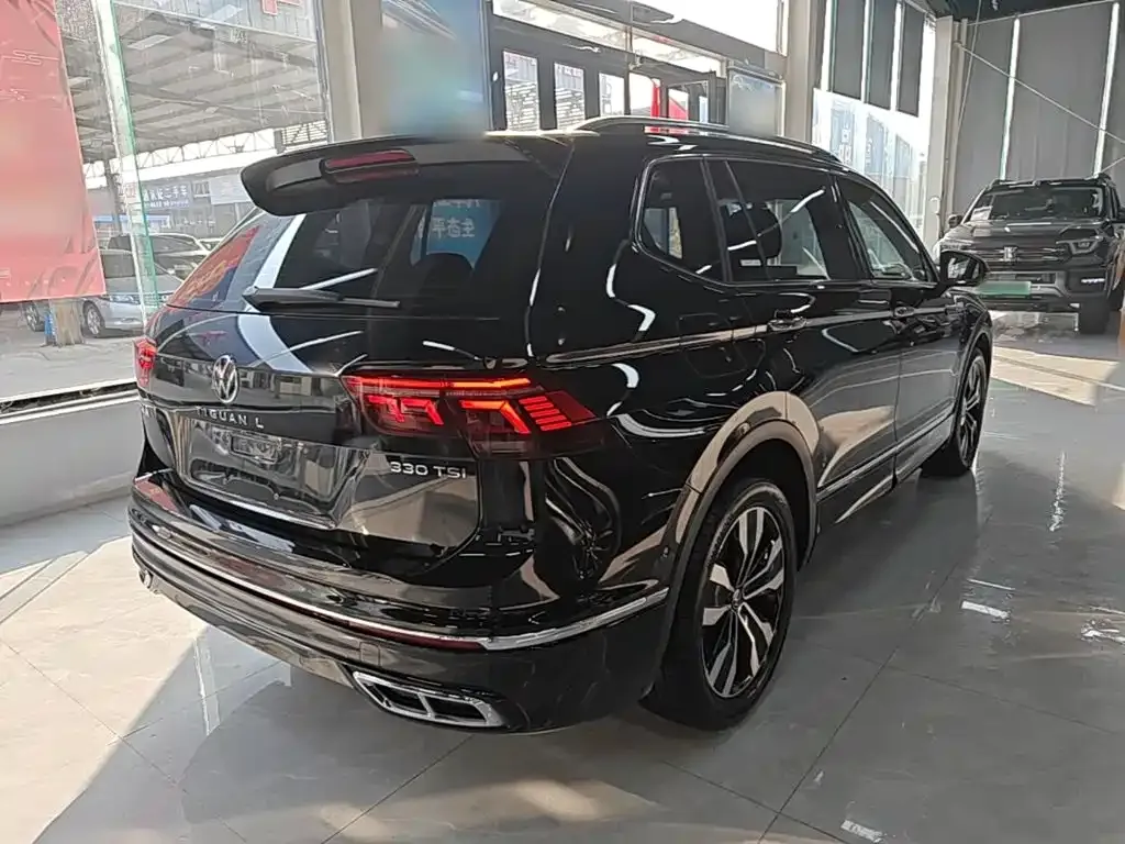 Volkswagen Tiguan L — фото 10