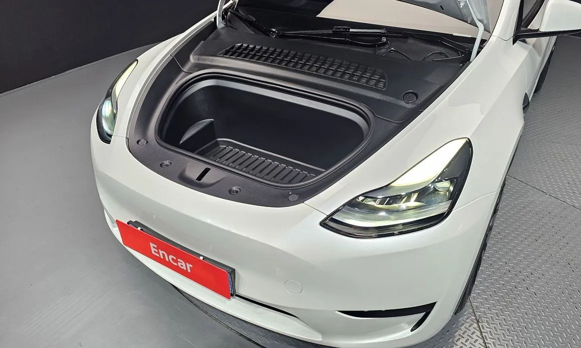 Tesla Model Y — фото 7