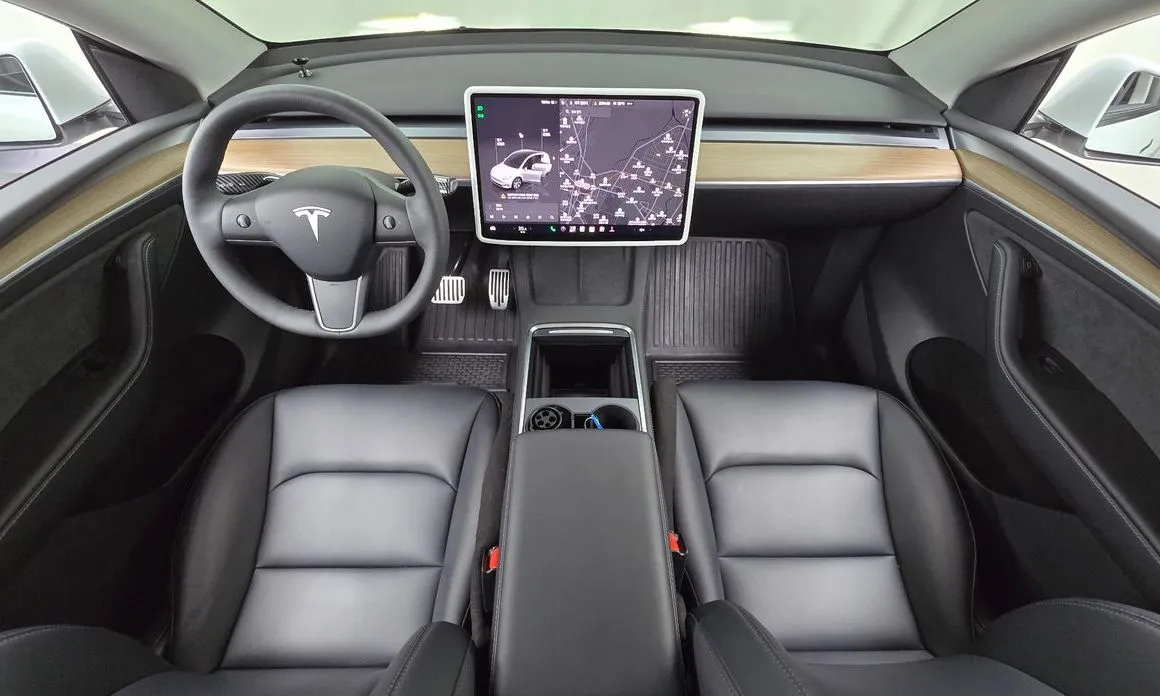Tesla Model Y — фото 8