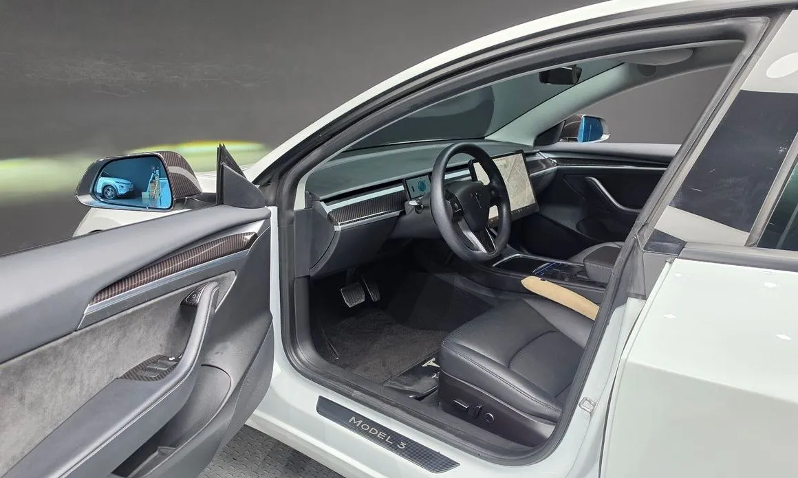 Tesla Model 3 — фото 9