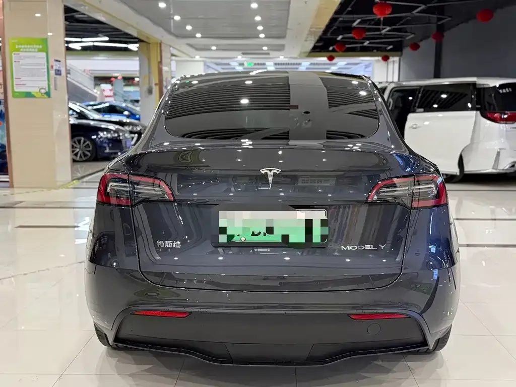 Tesla Model Y — фото 7