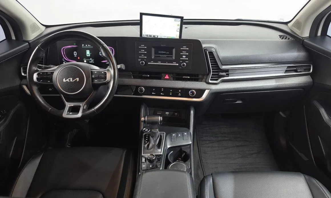 Kia Sportage — фото 5