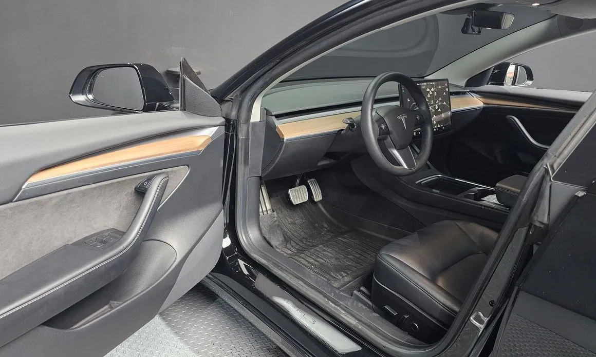 Tesla Model 3 — фото 10