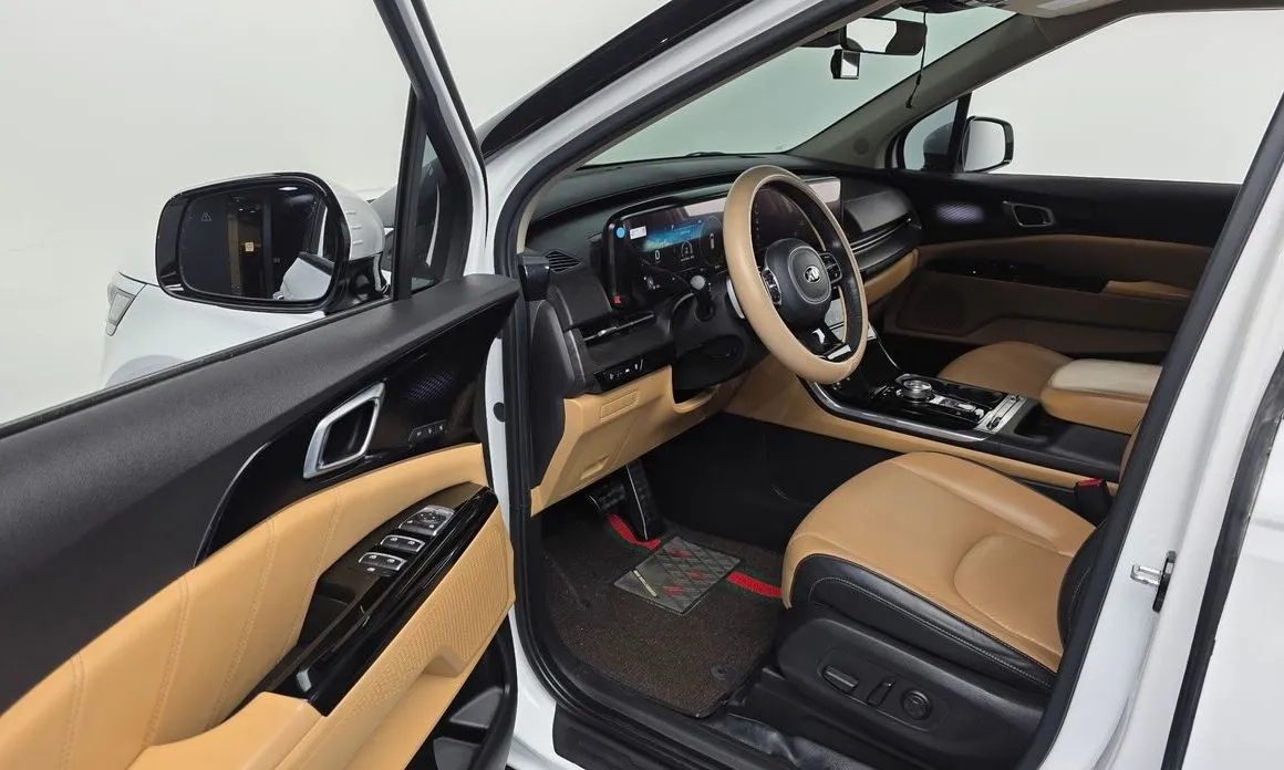 Kia Carnival — фото 10