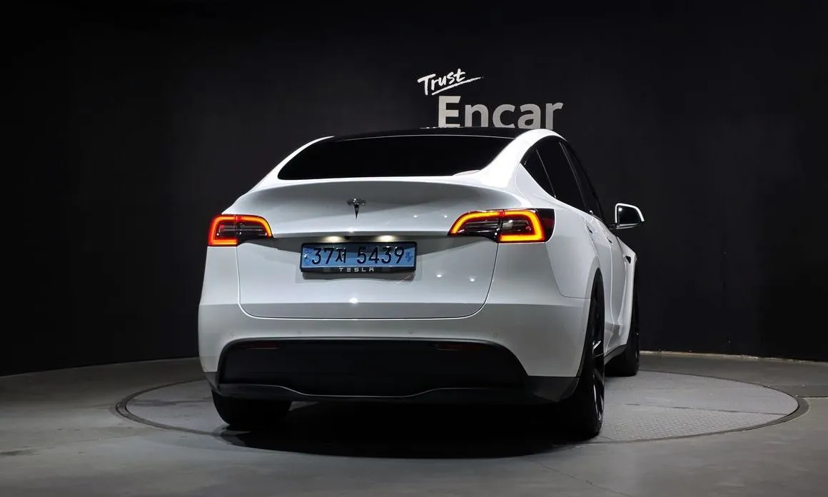 Tesla Model Y — фото 5