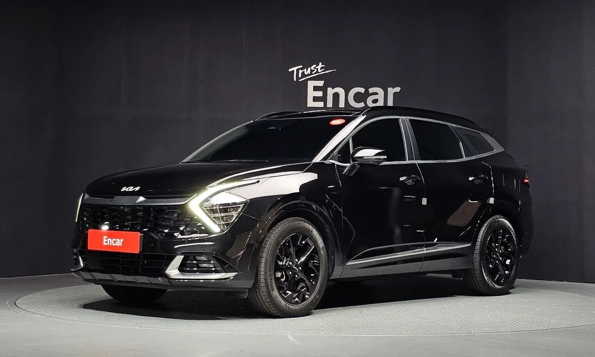 Kia Sportage — фото 1