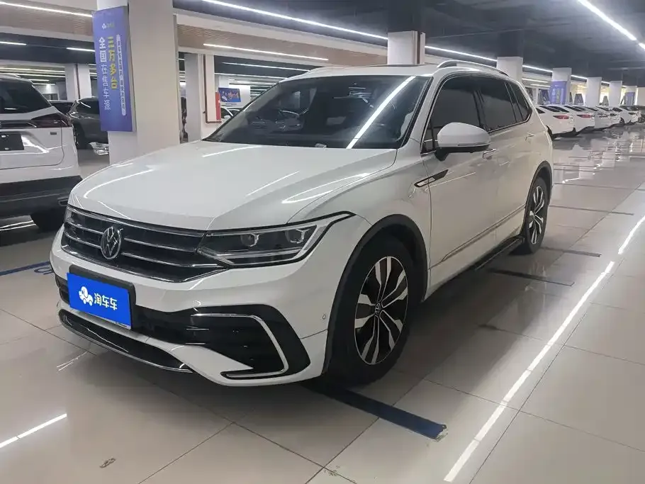 Volkswagen Tiguan L — фото 1