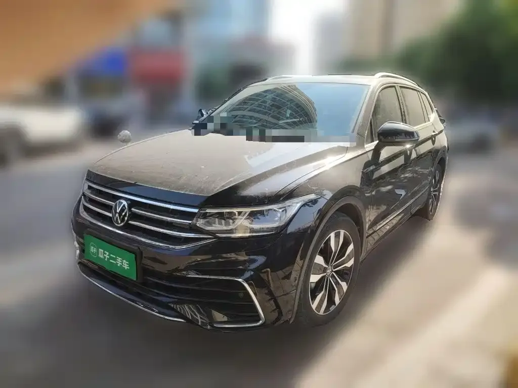 Volkswagen Tiguan L — фото 1