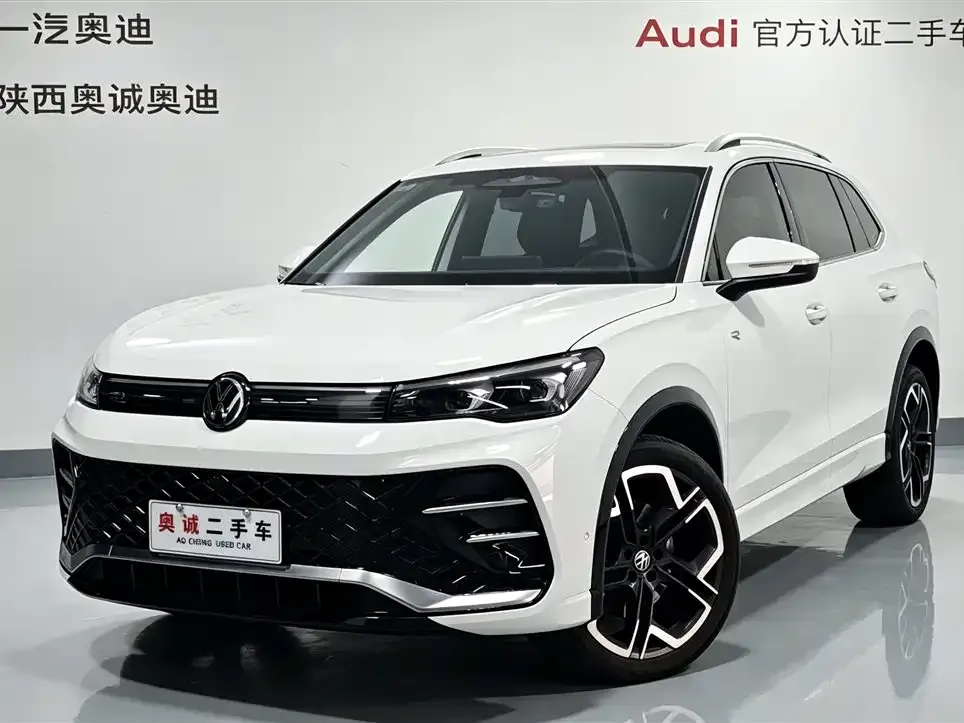 Volkswagen Tiguan L — фото 1