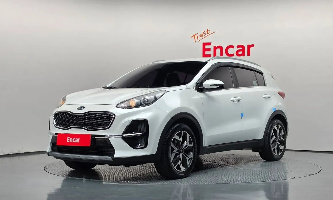 Kia Sportage — фото 1