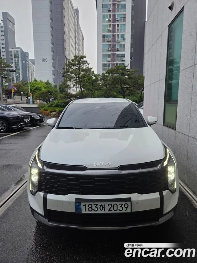 Kia Sportage — фото 1