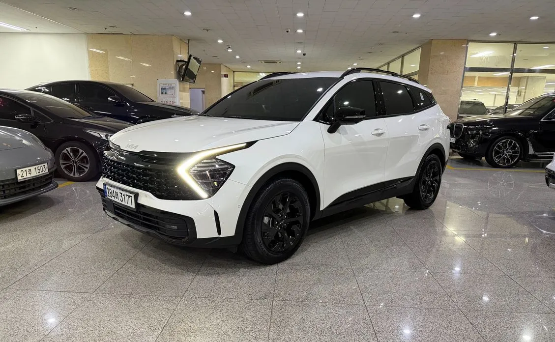 Kia Sportage — фото 1