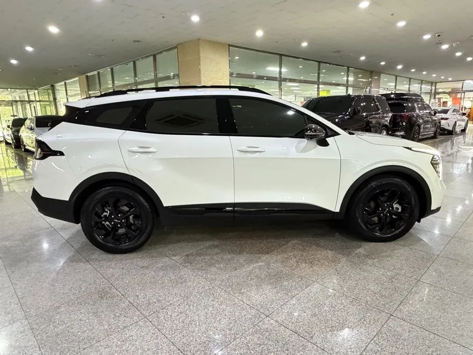 Kia Sportage — фото 5