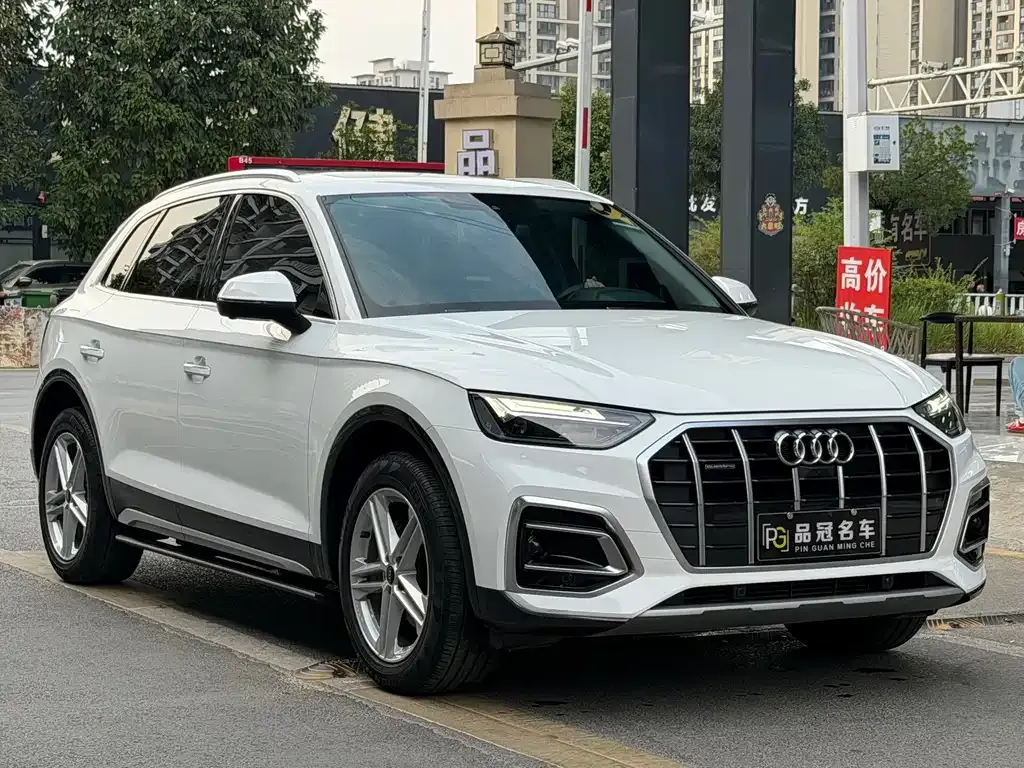 Audi Q5L — фото 6