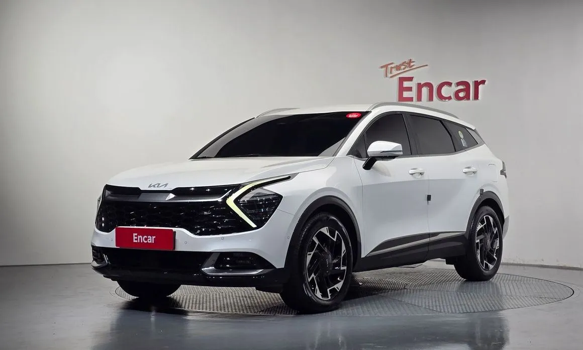 Kia Sportage — фото 1