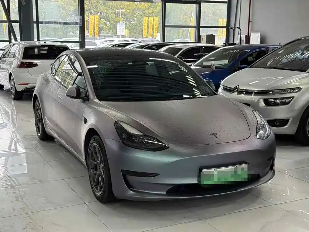 Tesla Model 3 — фото 7