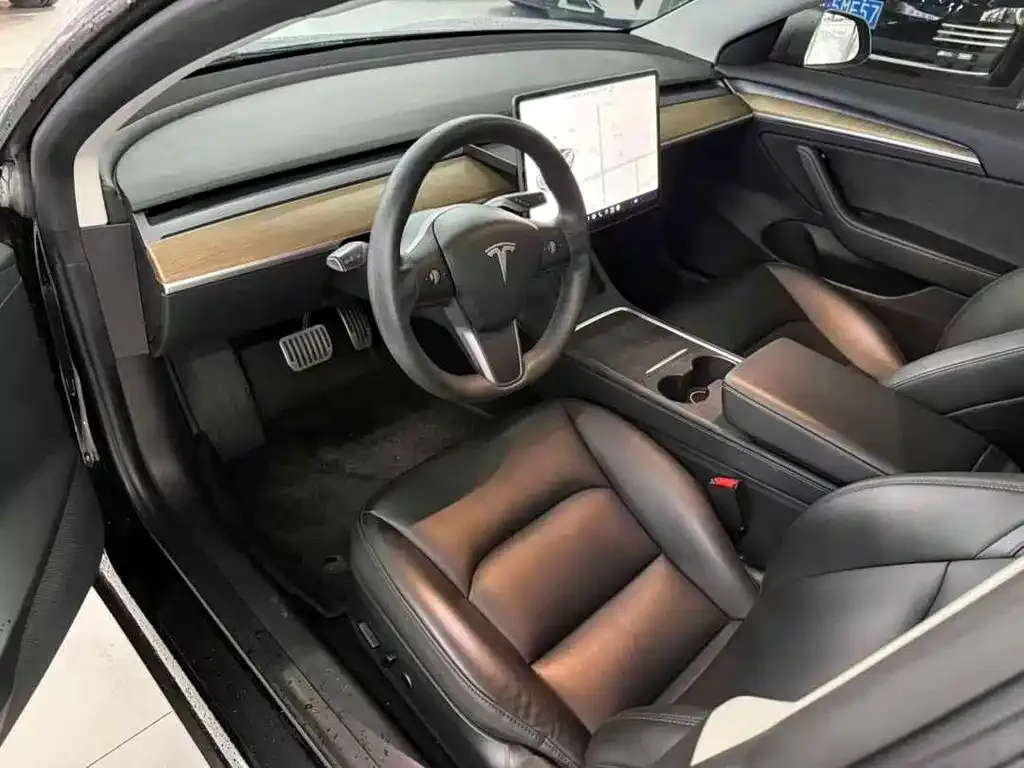 Tesla Model 3 — фото 3