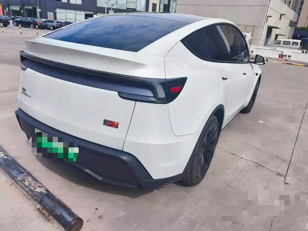 Tesla Model Y — фото 7