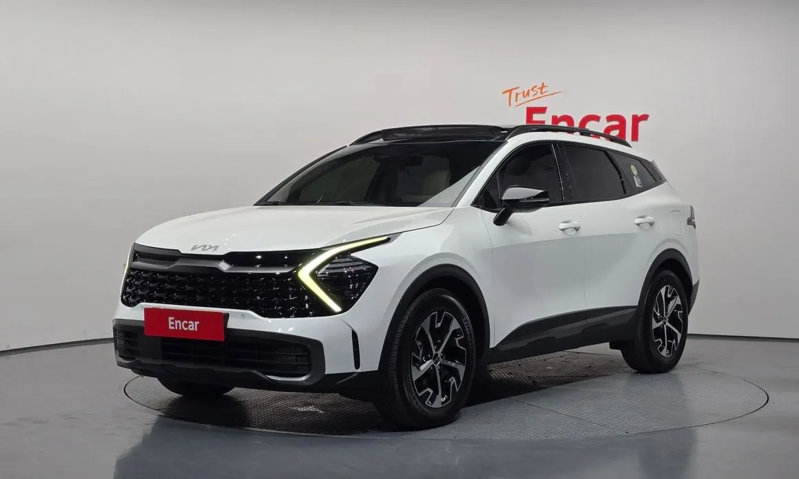 Kia Sportage — фото 1