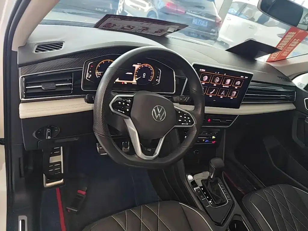 Volkswagen Tiguan L — фото 5