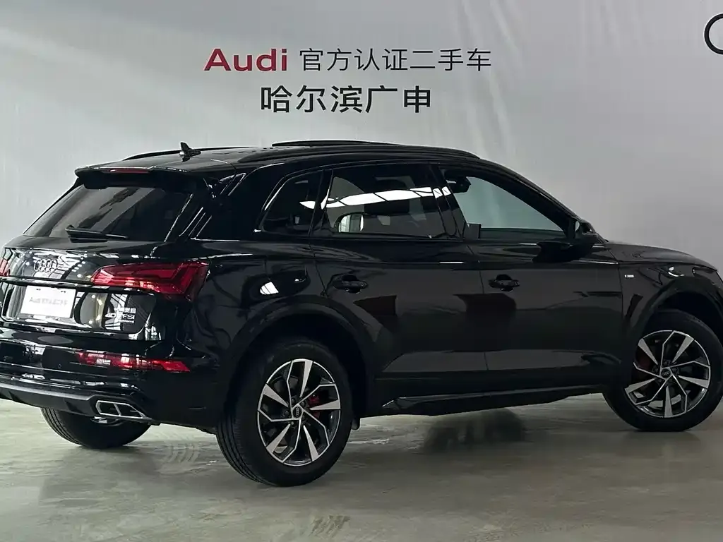 Audi Q5L — фото 10