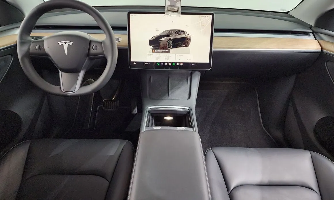 Tesla Model Y — фото 8