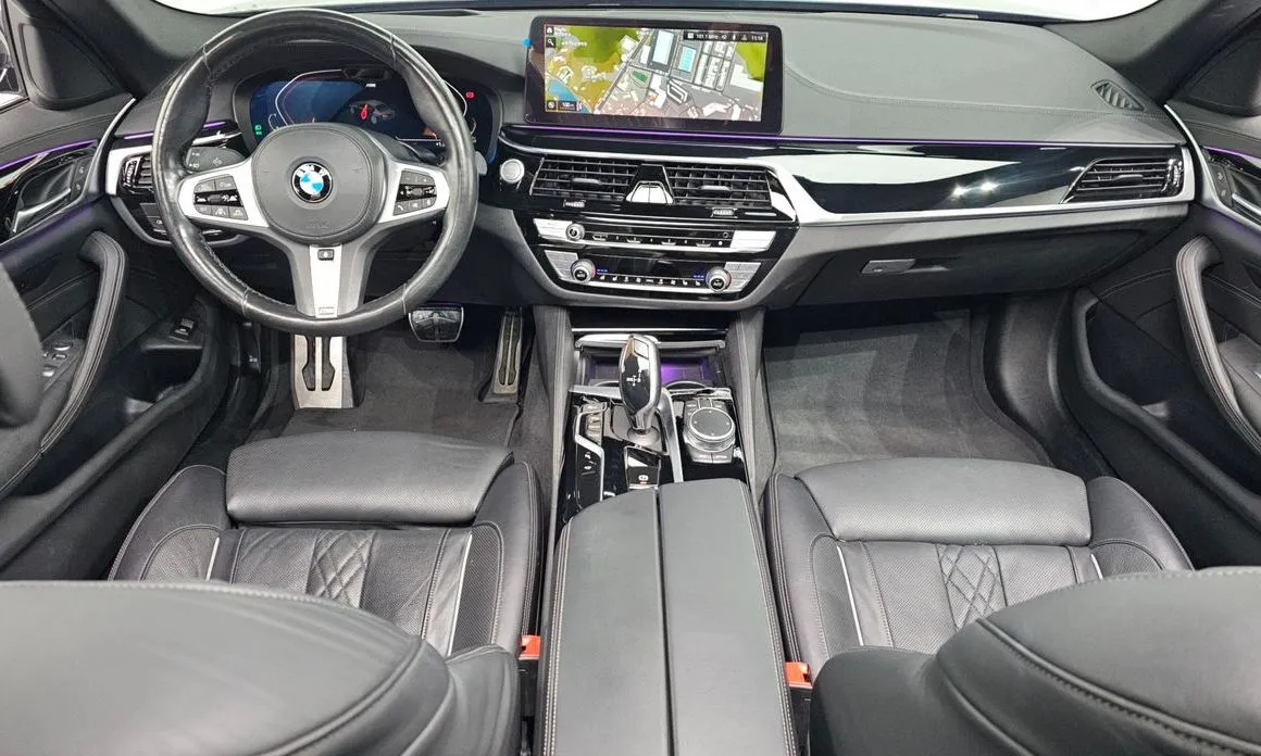 BMW 5-Series — фото 10