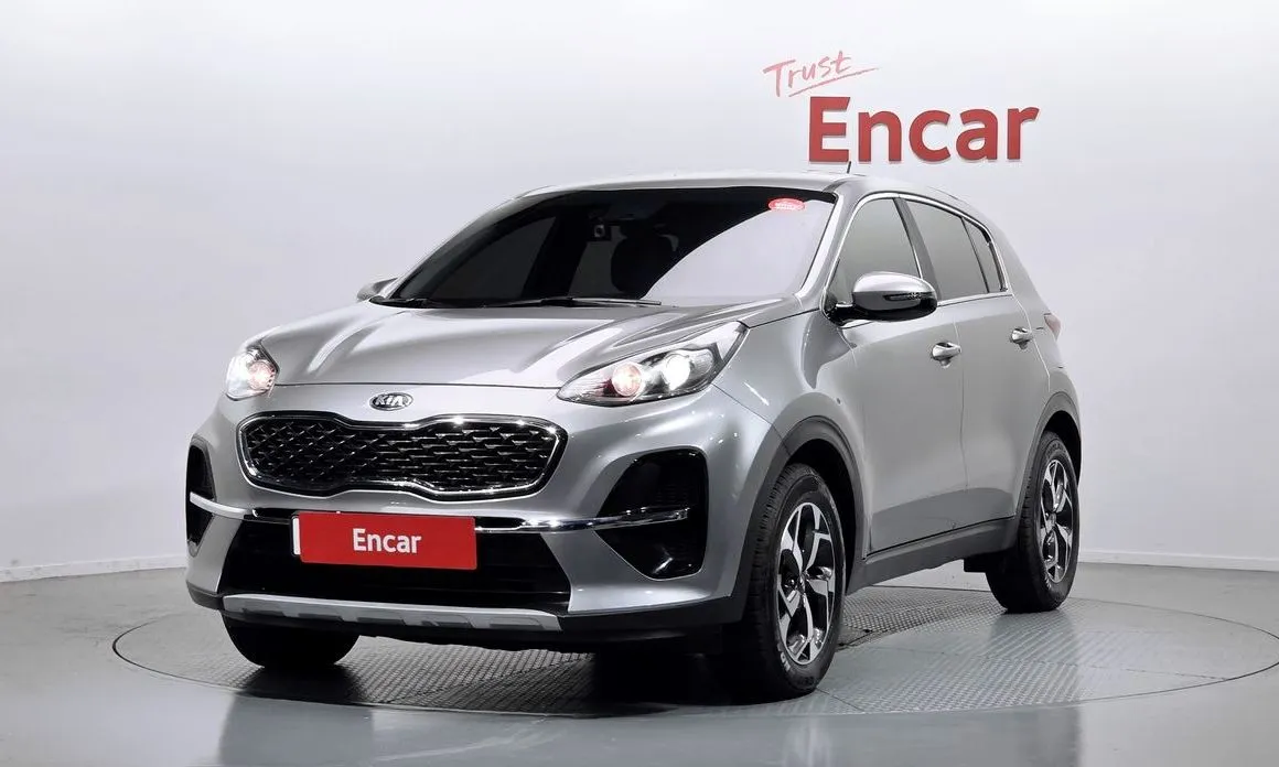 Kia Sportage — фото 1