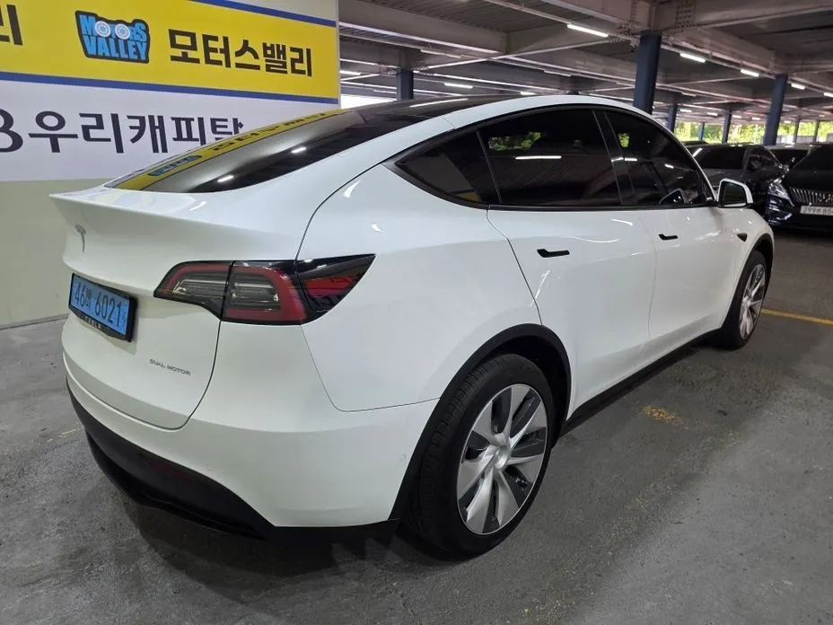 Tesla Model Y — фото 8