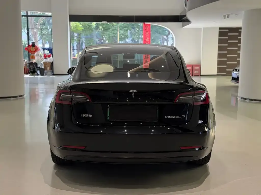 Tesla Model 3 — фото 7