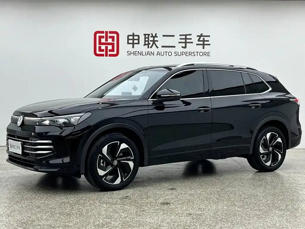 Volkswagen Tiguan L — фото 1