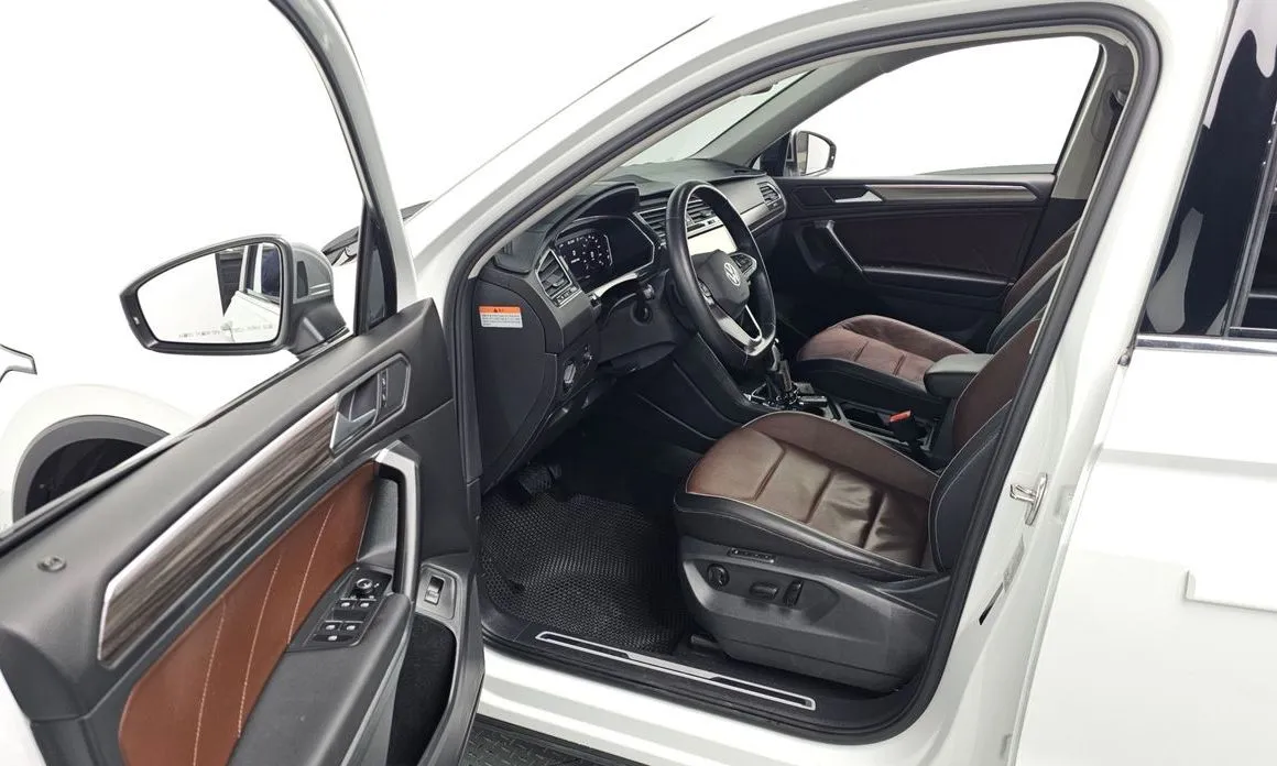 Volkswagen Tiguan — фото 6
