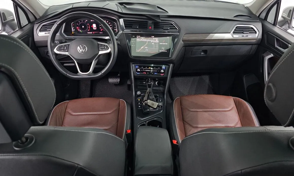 Volkswagen Tiguan — фото 8