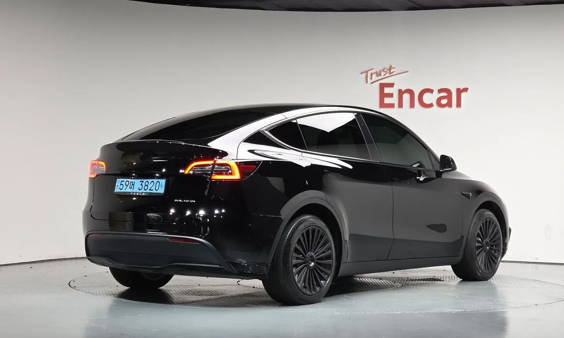 Tesla Model Y — фото 7