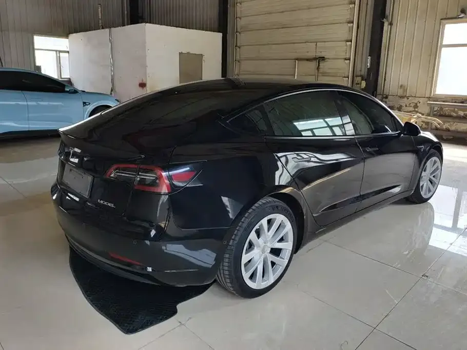 Tesla Model 3 — фото 7