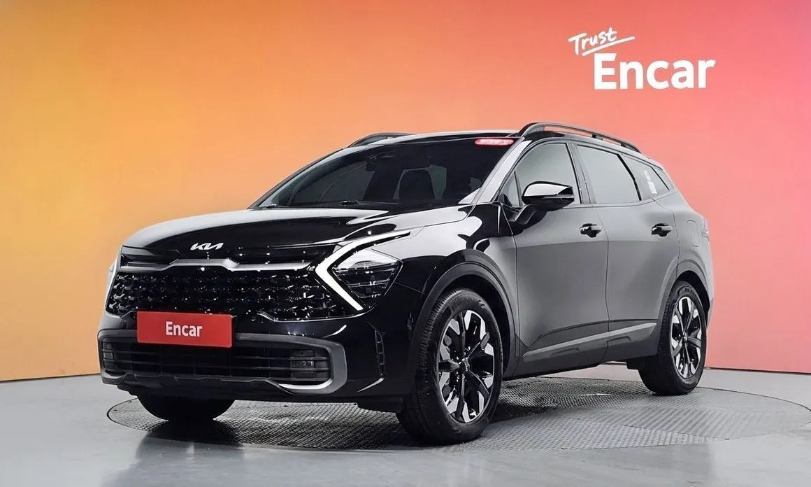 Kia Sportage — фото 1