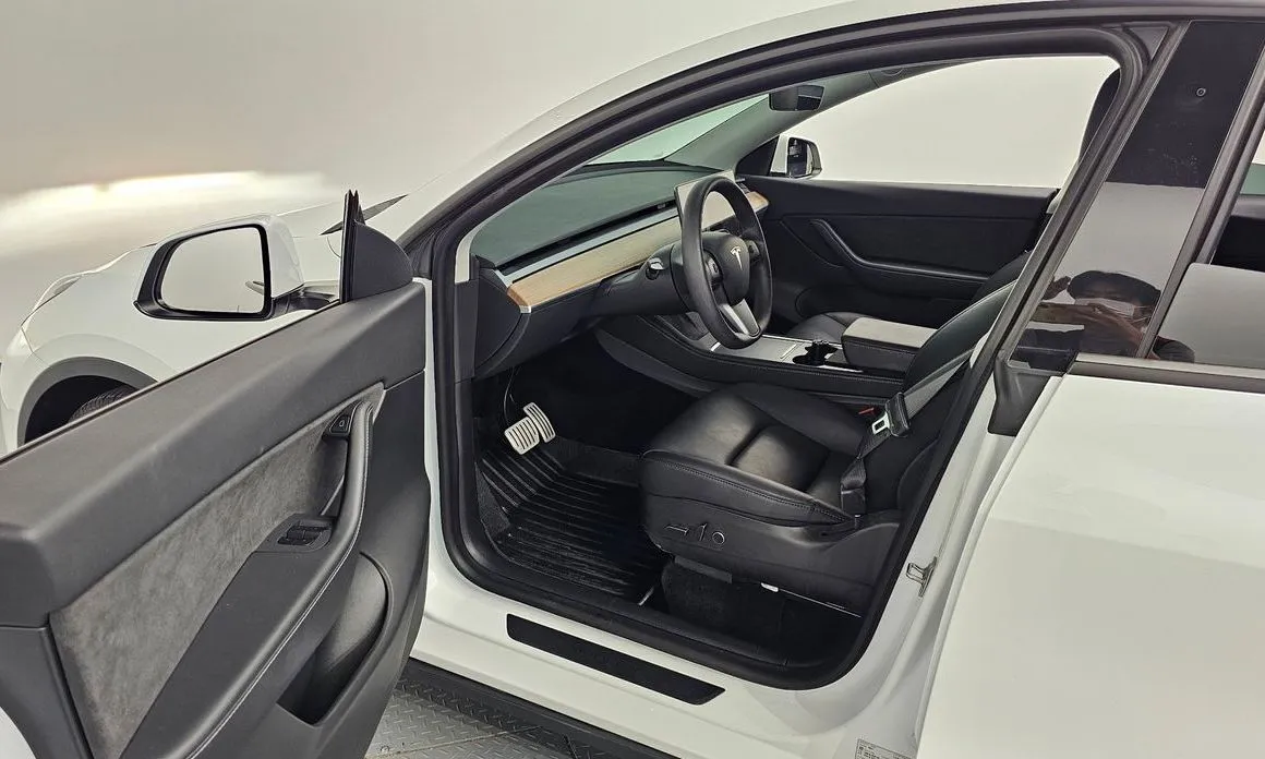 Tesla Model Y — фото 9
