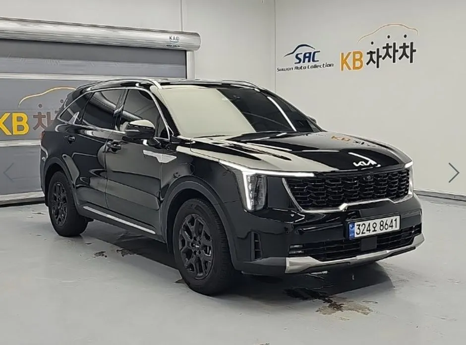 Kia Sorento — фото 7
