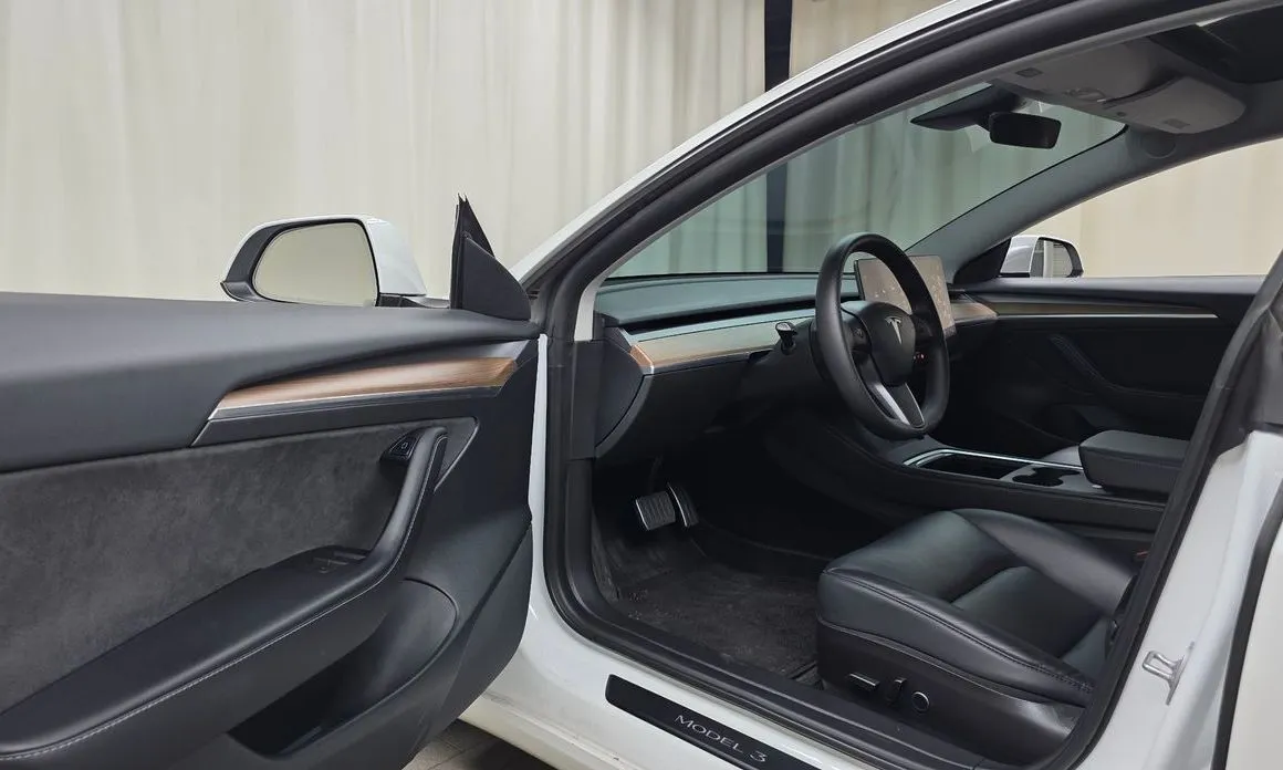 Tesla Model 3 — фото 7