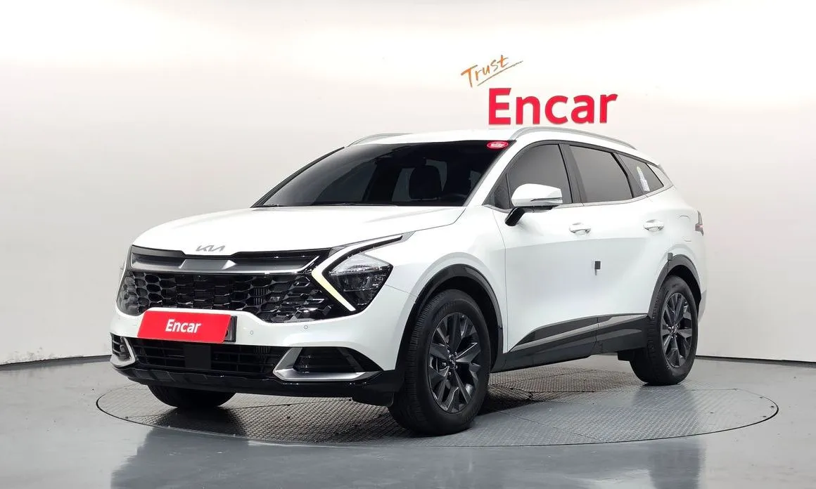Kia Sportage — фото 1