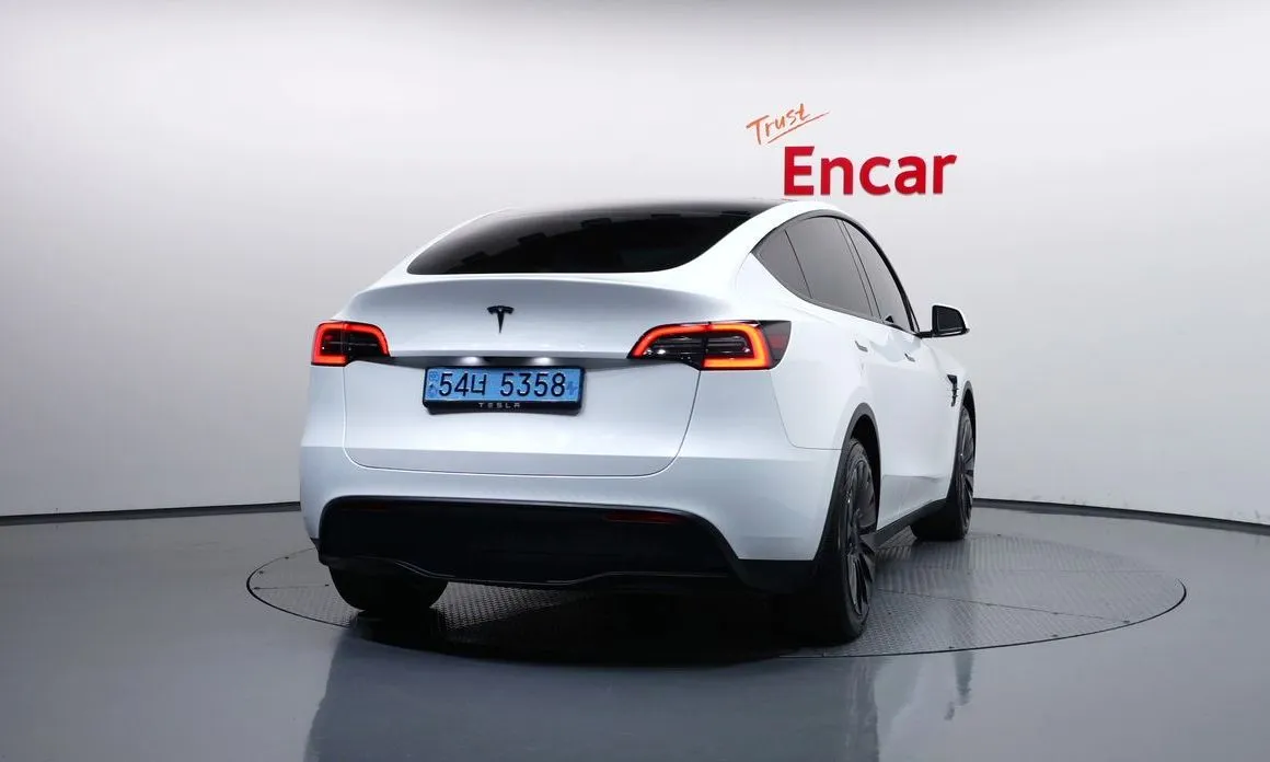 Tesla Model Y — фото 7