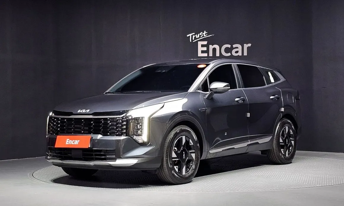 Kia Sportage — фото 1