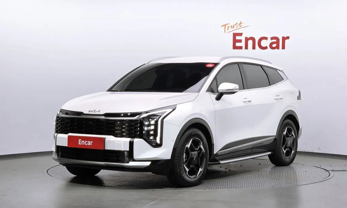 Kia Sportage — фото 1