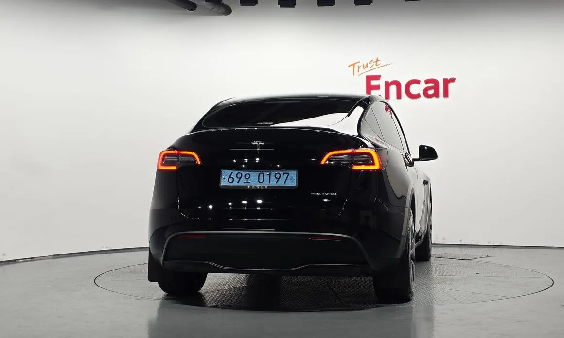 Tesla Model Y — фото 7