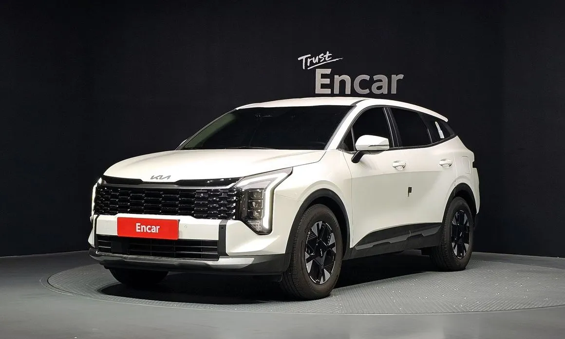 Kia Sportage — фото 1