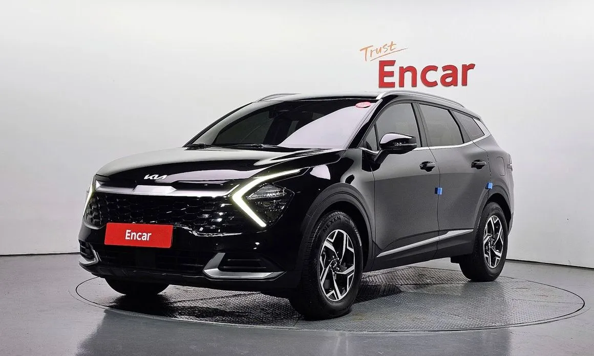 Kia Sportage — фото 1