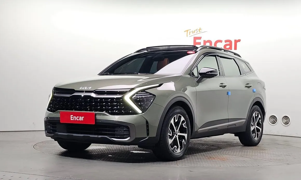 Kia Sportage — фото 1