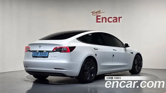 Tesla Model 3 — фото 10